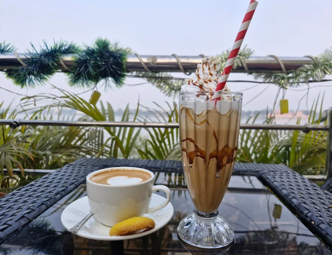 Mocha frappe and cappuccino with river view