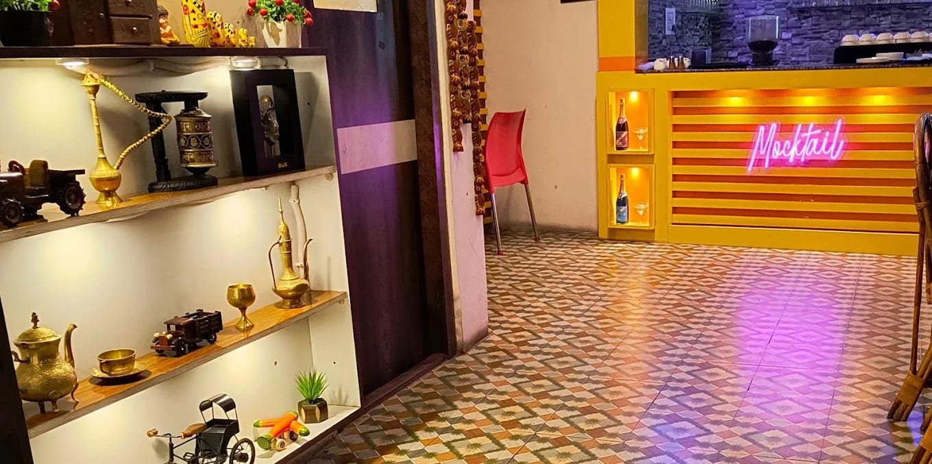 Neon Mocktail bar with curio shelf